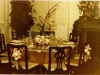 Low and lush dinner settings with flowering branch in center for height.  Ladies chairs finished with hanging nosegays.