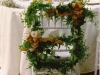 Bridal chair embellished with English ivy, roses and French wired ribbons.