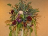 Escort card table finished with birch pole topirary of wild flowers, spiral eucalyptus and wild flowers