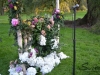 Handcrafted arbor of hydrangeas, roses, English ivy and more